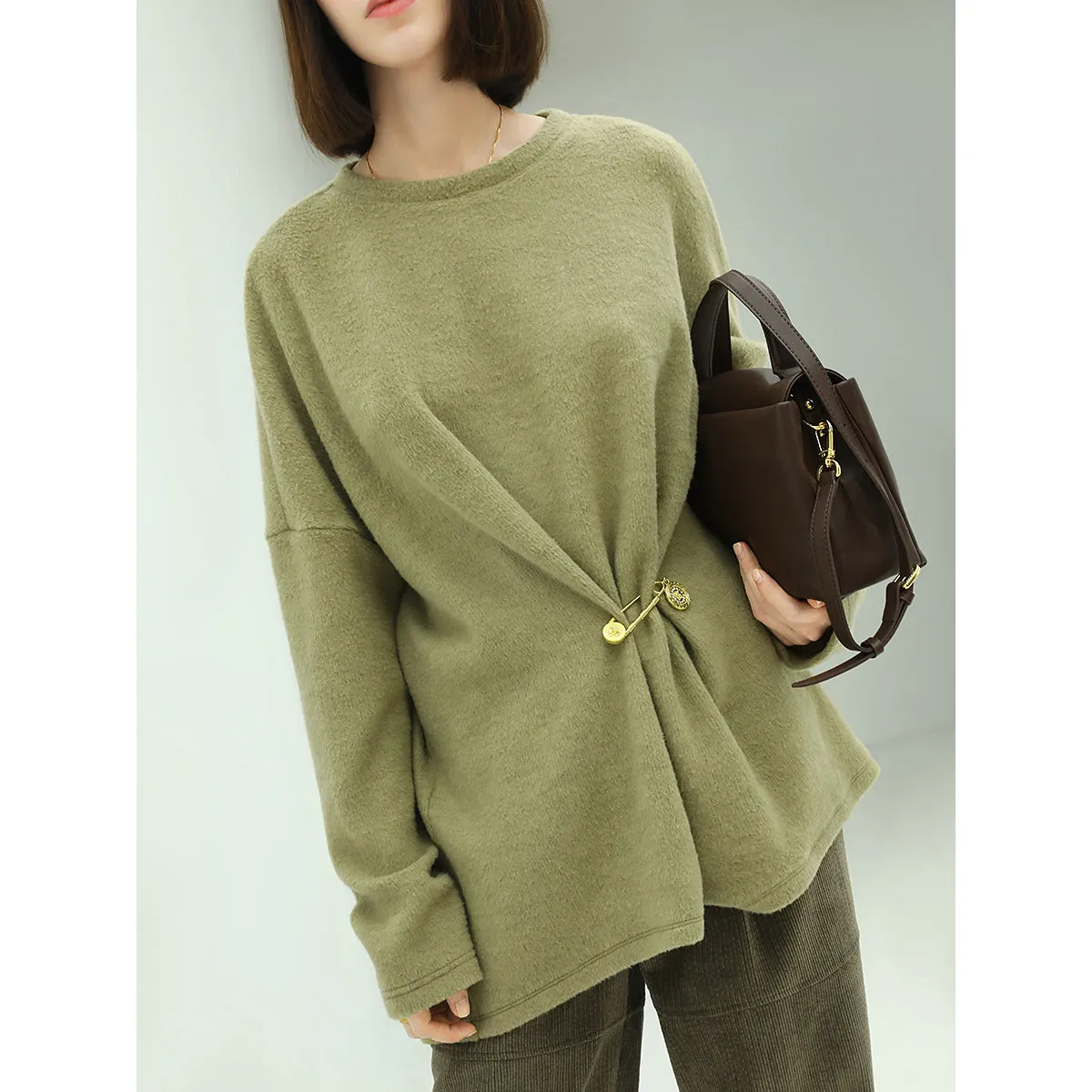 Oversized Green Fleece Knit with a Stylish Cinched Brooch Pin