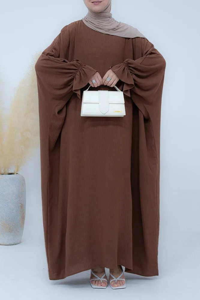 Radwa batwing abaya with ruched sleeve and loose cut in coffee