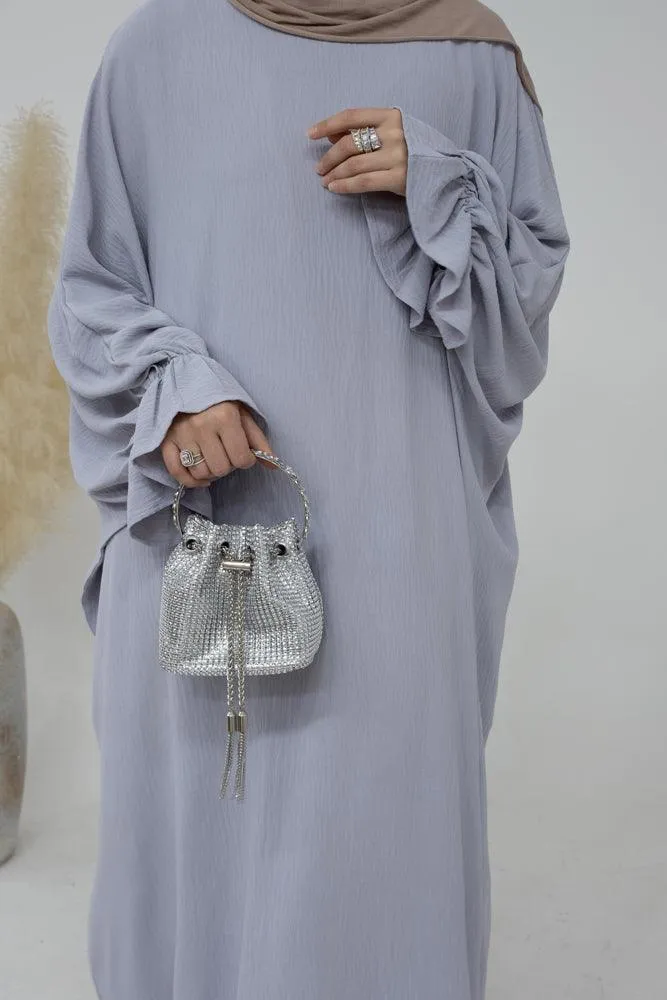 Radwa batwing abaya with ruched sleeve and loose cut in light grey