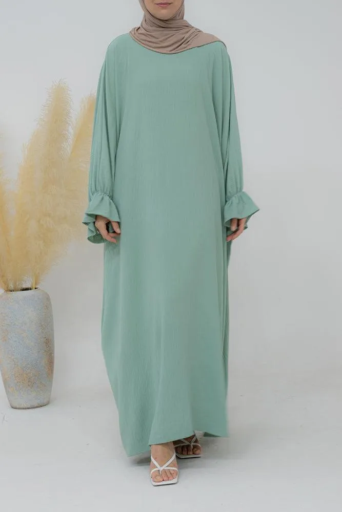 Radwa batwing abaya with ruched sleeve and loose cut in mint green