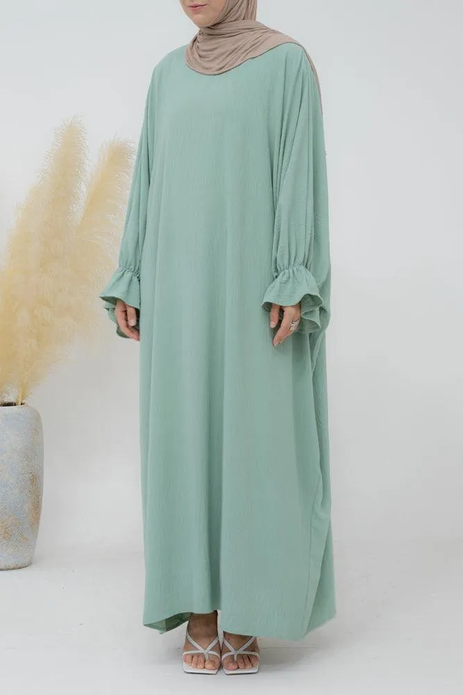 Radwa batwing abaya with ruched sleeve and loose cut in mint green