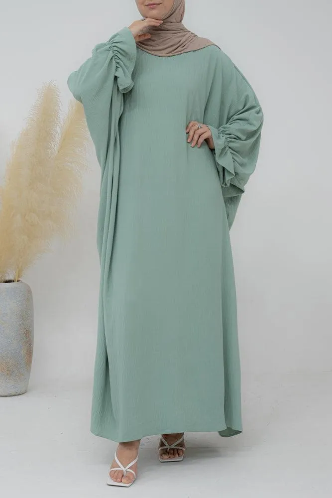 Radwa batwing abaya with ruched sleeve and loose cut in mint green