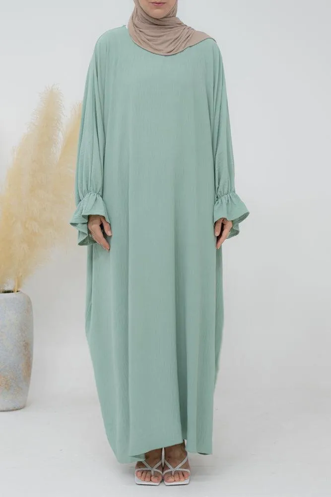 Radwa batwing abaya with ruched sleeve and loose cut in mint green