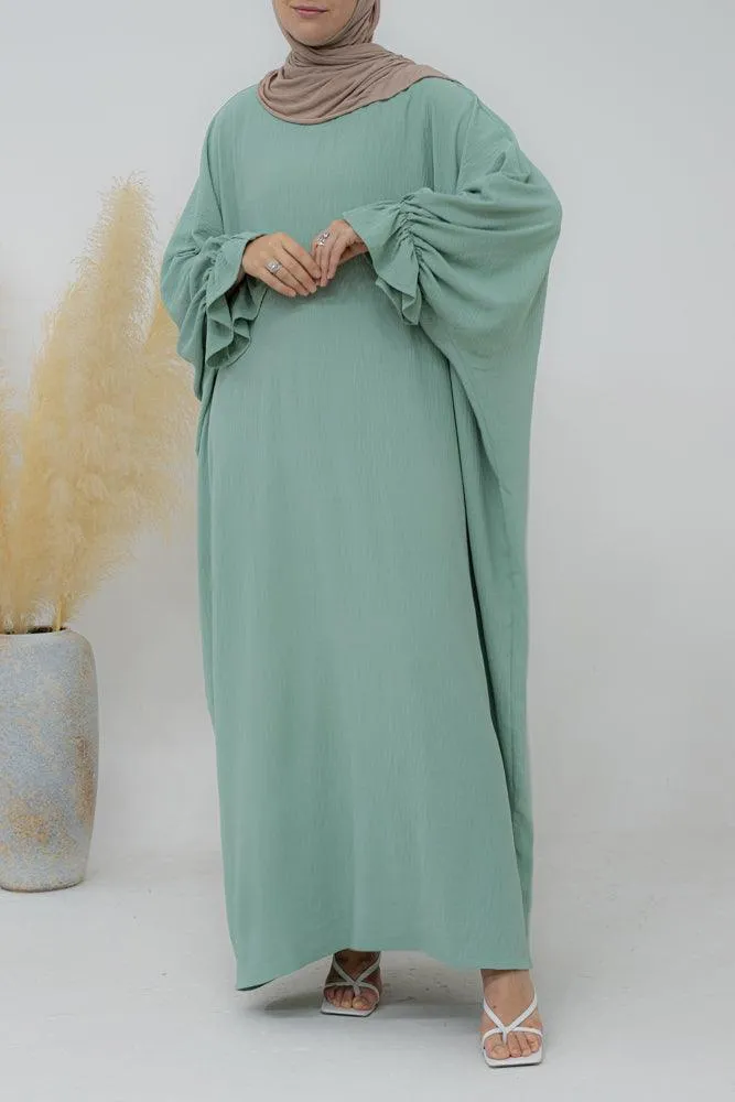 Radwa batwing abaya with ruched sleeve and loose cut in mint green