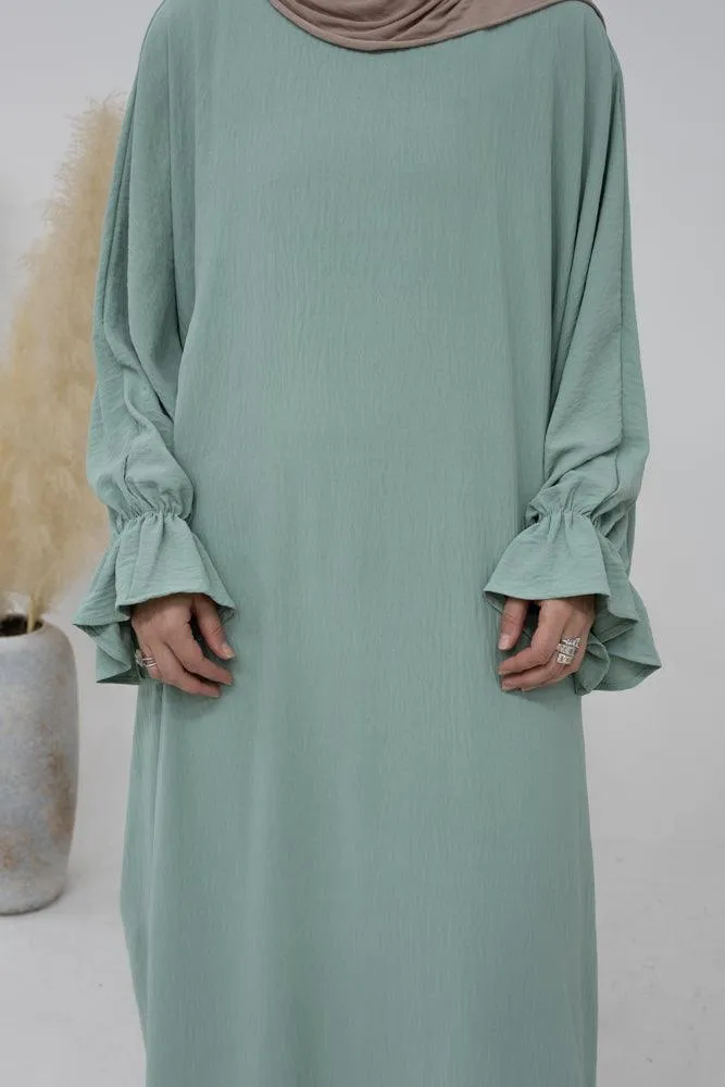 Radwa batwing abaya with ruched sleeve and loose cut in mint green